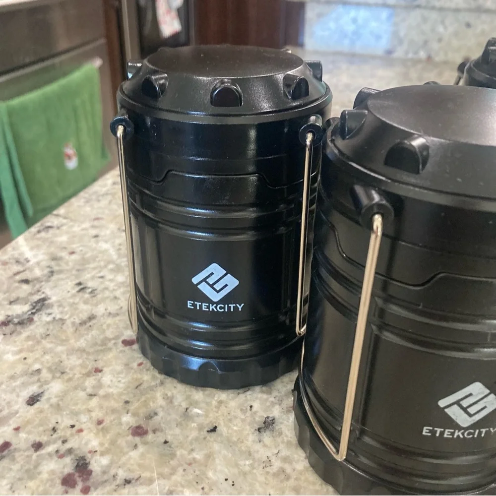 Set of 4 Etekcity black LED travel/camping lanterns Preowned **No Batteries**